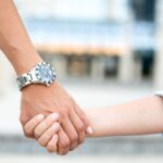 woman-and-man-holding-hands-1-050125-cf403219d9394caab46485a221bb1b94.jpg